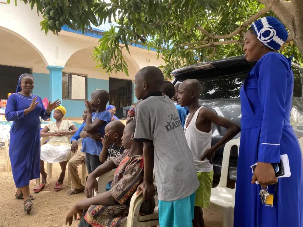 Child receiving school supplies